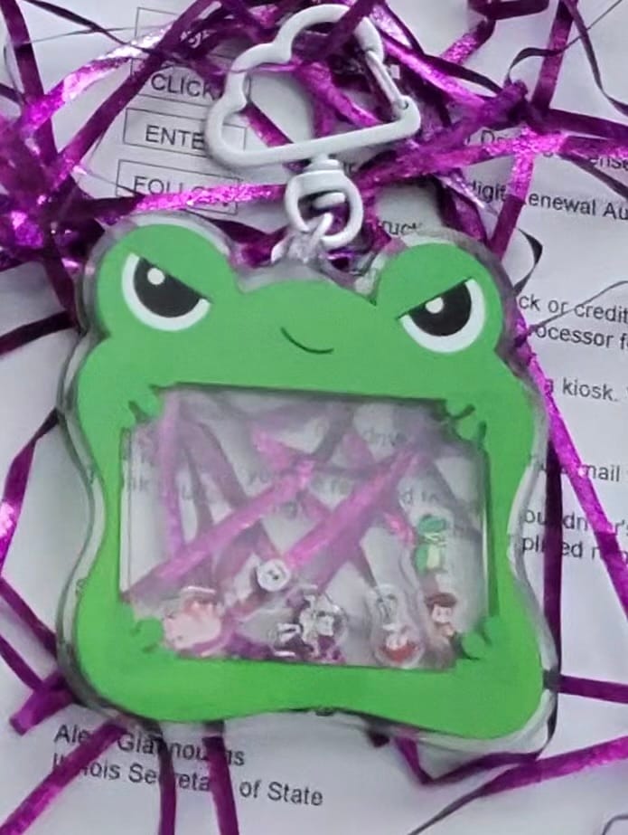 Customer photo review of Lilypad Toy Story 5 Shaker Keychain – Acrylic Disney Pixar Bag Charm with Cloud Carabiner