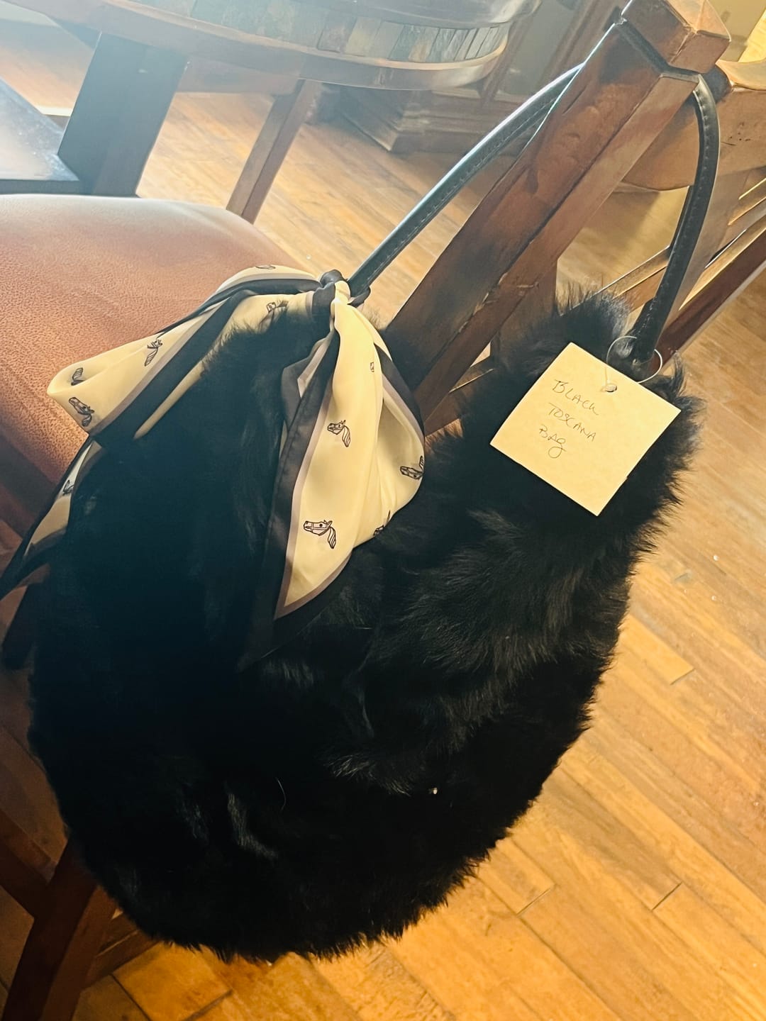 Customer photo review of Black Toscana Shearling Fur Hobo Bag