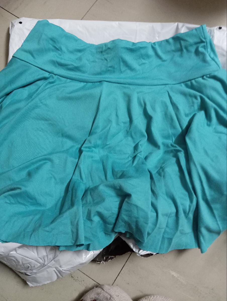 Customer photo review of Jupe-short de sport plissée avec poche