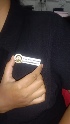 Customer photo review of Customized Magnetic Badge | Wear Your Brand