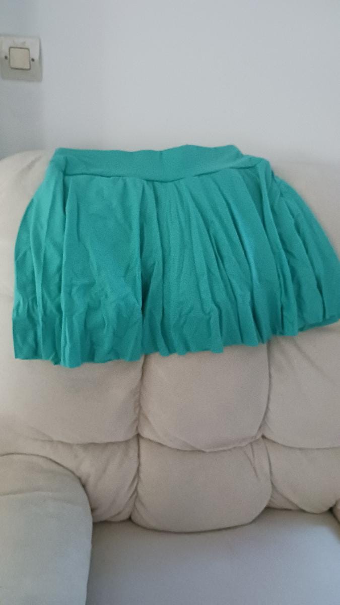 Customer photo review of Jupe-short de sport plissée avec poche