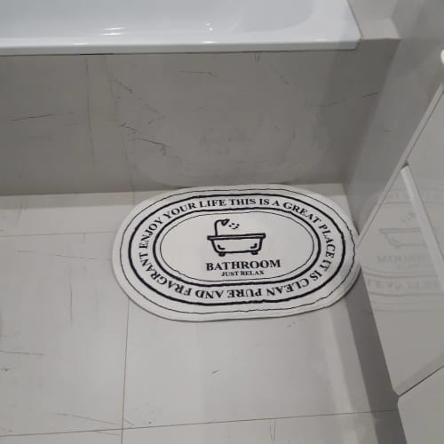 Customer photo review of Non-Slip Bath Mat - Floral Plush Absorbent Rug