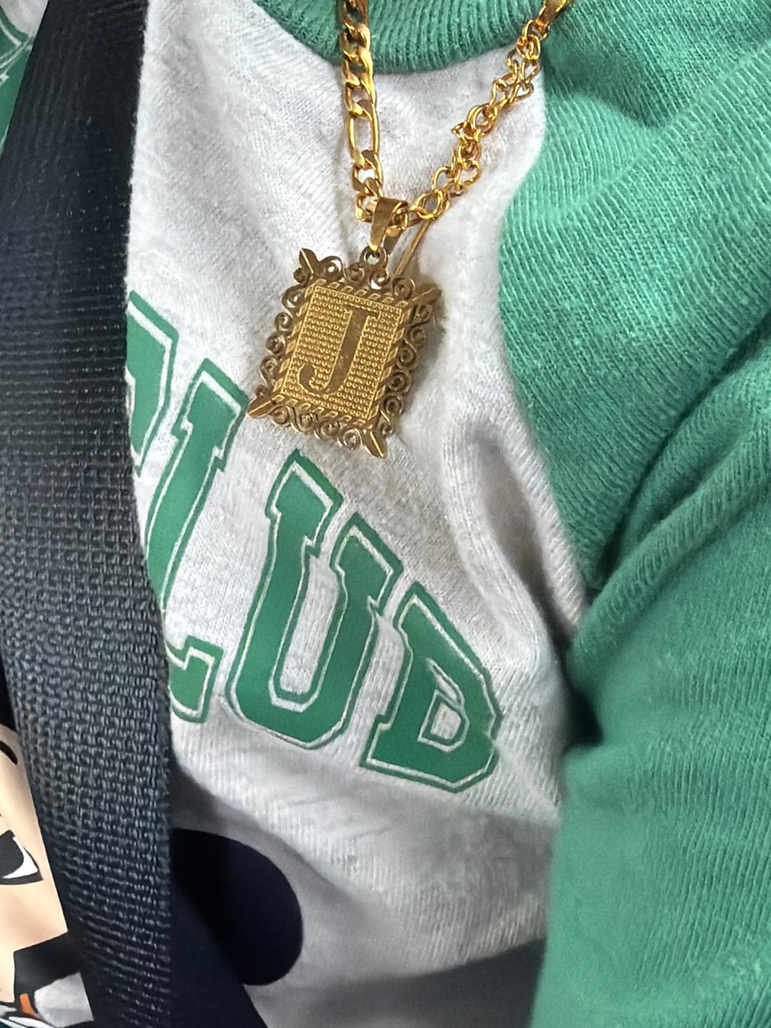 Customer photo review of Kids Embossed Initial Necklace w/ Figaro Chain