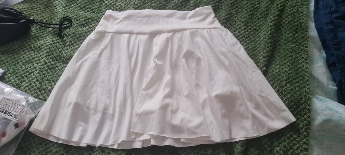 Customer photo review of Jupe-short de sport plissée avec poche