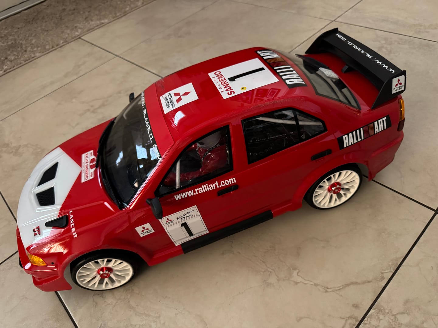 Customer photo review of Mitsubishi EVO 6.5 TME Licensed 1/7 Brushless RTR RC Rally Car | SLEVO-07