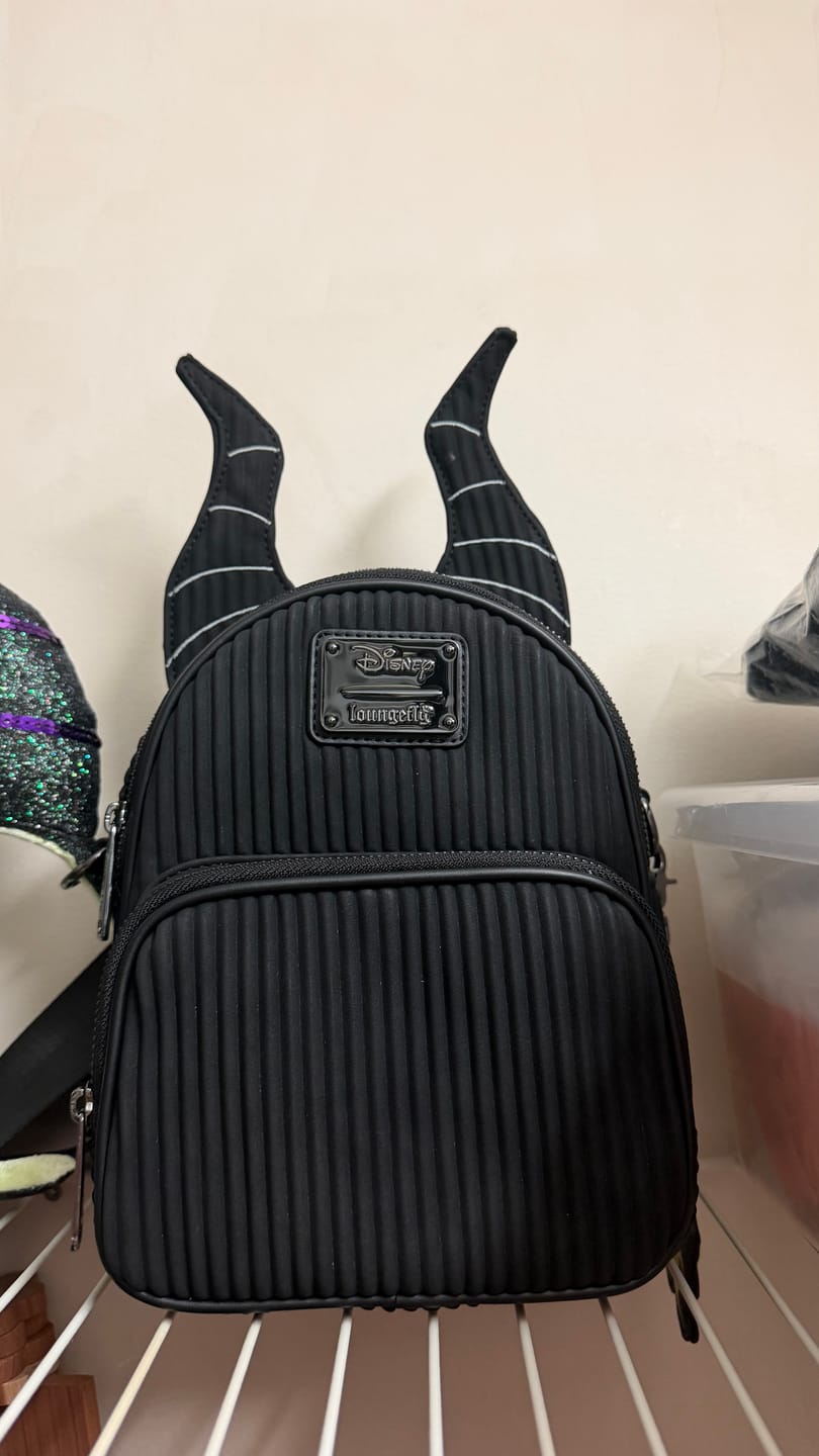 Customer photo review of Loungefly Sleeping Beauty Maleficent Dragon Convertible Mini Backpack & Crossbody Bag