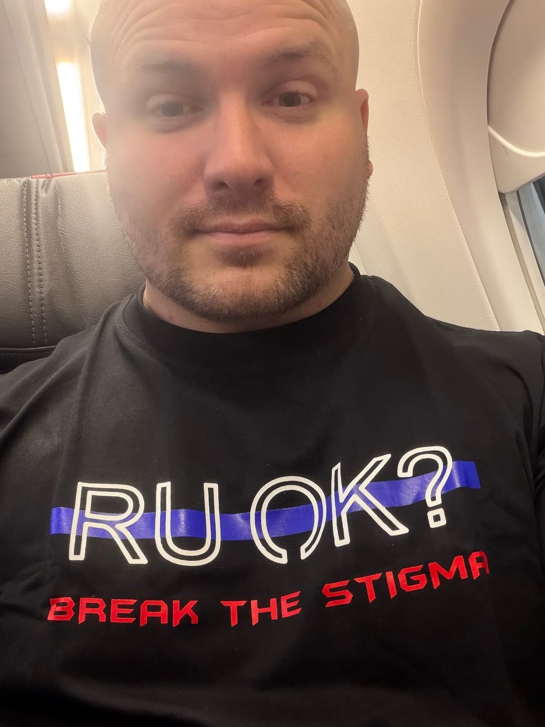Customer photo review of Stigma-Breaking Unisex Tee - Blue Line