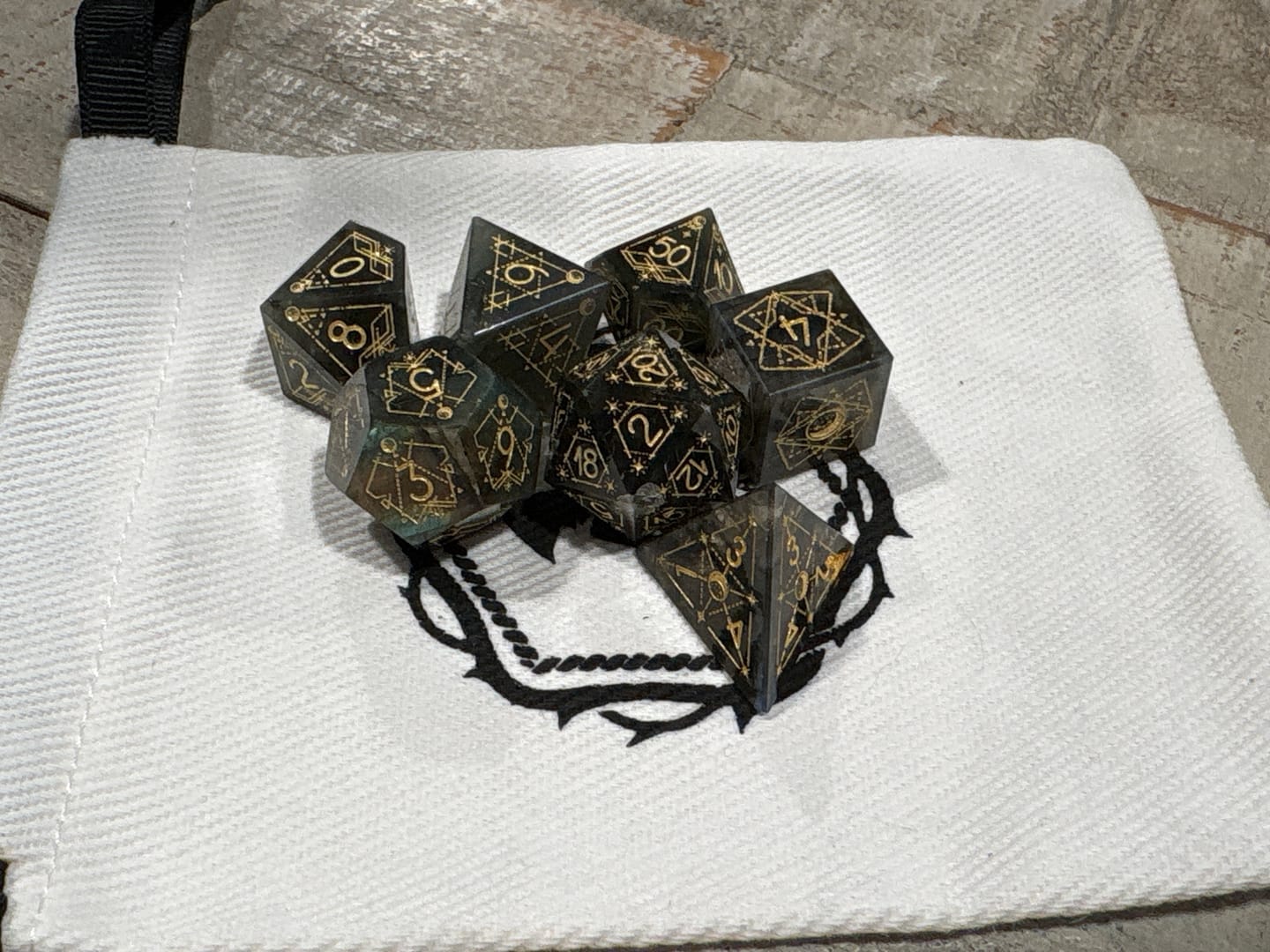 Customer photo review of URWizards D&D Labradorite Engraved Dice Set Astrology Style