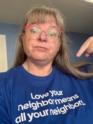 Customer photo review of Love Your Neighbor Means All Your Neighbors Unisex Tee