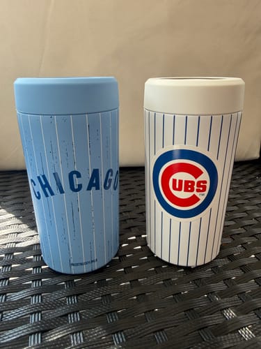 Customer's two Chicago Cubs Cooperstown style can coolers, one light blue and one white with pinstripes.