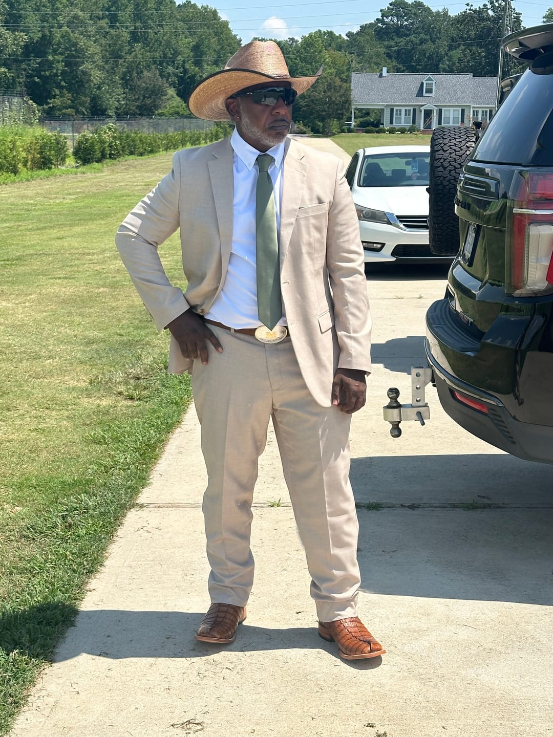 Customer photo review of Justin® Men's Bent Rail Buck Up Brown Straw Cowboy Hat JS1956BKUP42