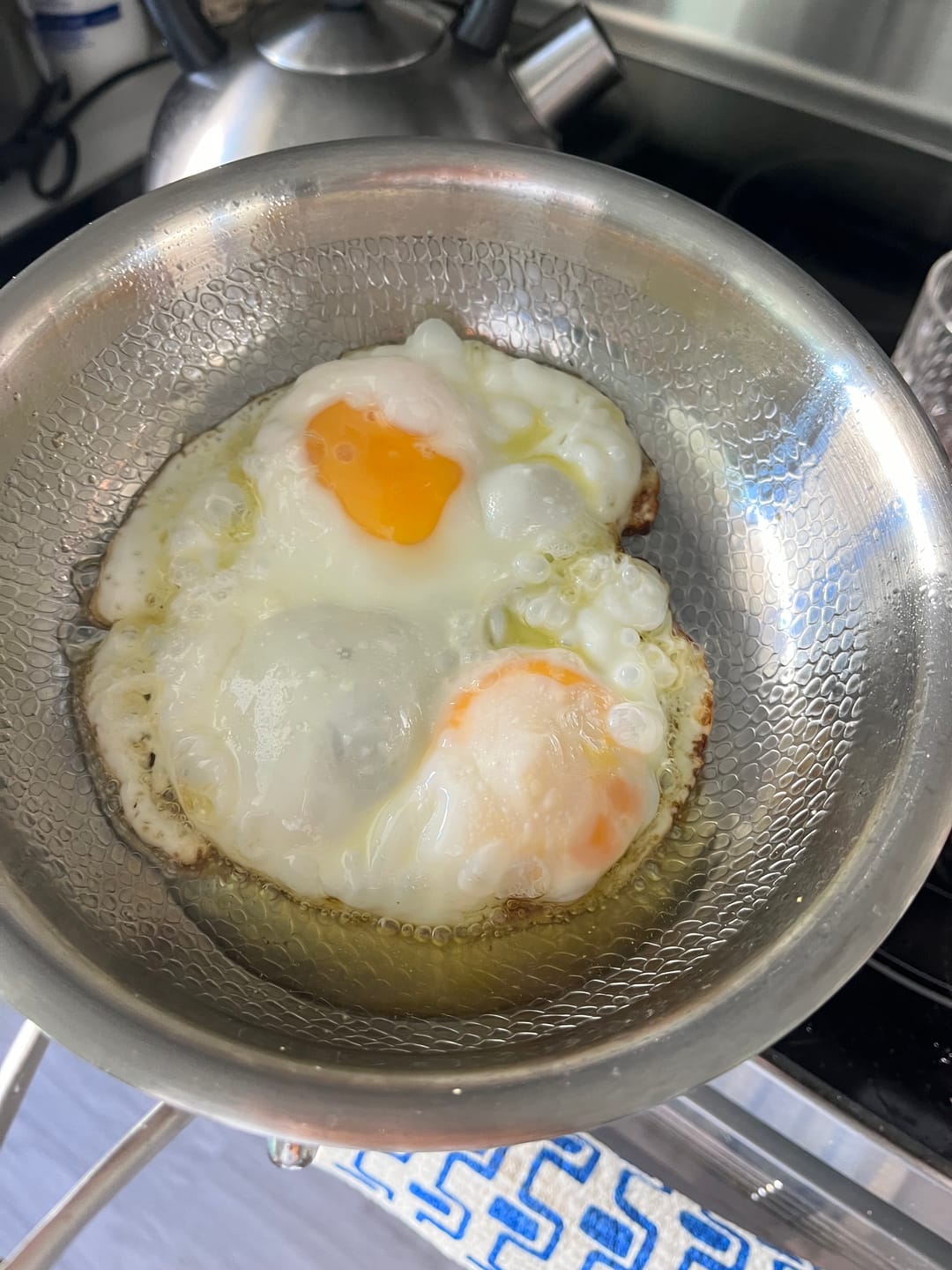 Customer photo review of Hand-Hammered Titanium Stir-Fry Set with 1 Lid (8, 8 & 10 Inch)