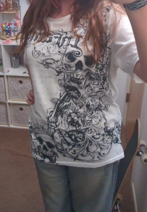 Customer photo review of 'INFAMOUS' TEE