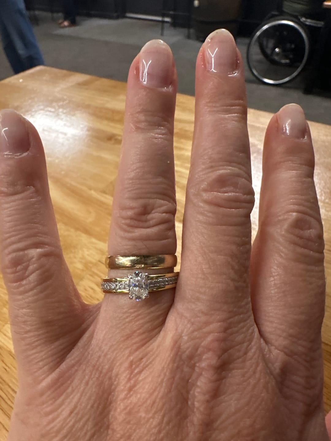 Customer photo review of Hidden Halo Oval Moissanite Three Row Two Tone Engagement Ring
