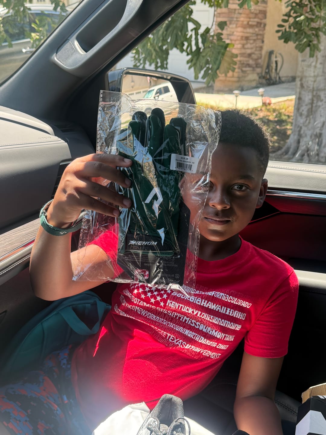 Customer photo review of Phenom Elite VPS5 Youth Football Gloves - Team Colors