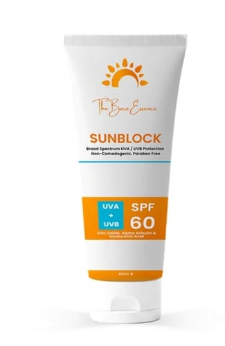 Customer's SPF 60 Non Comedogenic Sunblock white tube featuring orange branding and sun logo.