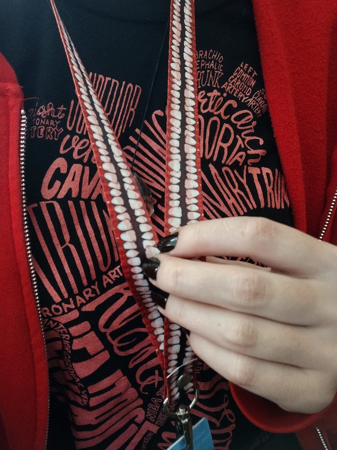 Customer photo review of Creepy Teeth Lanyard!
