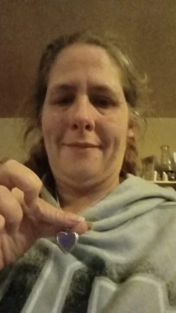 Customer photo review of Collar Corazón Cambia Color