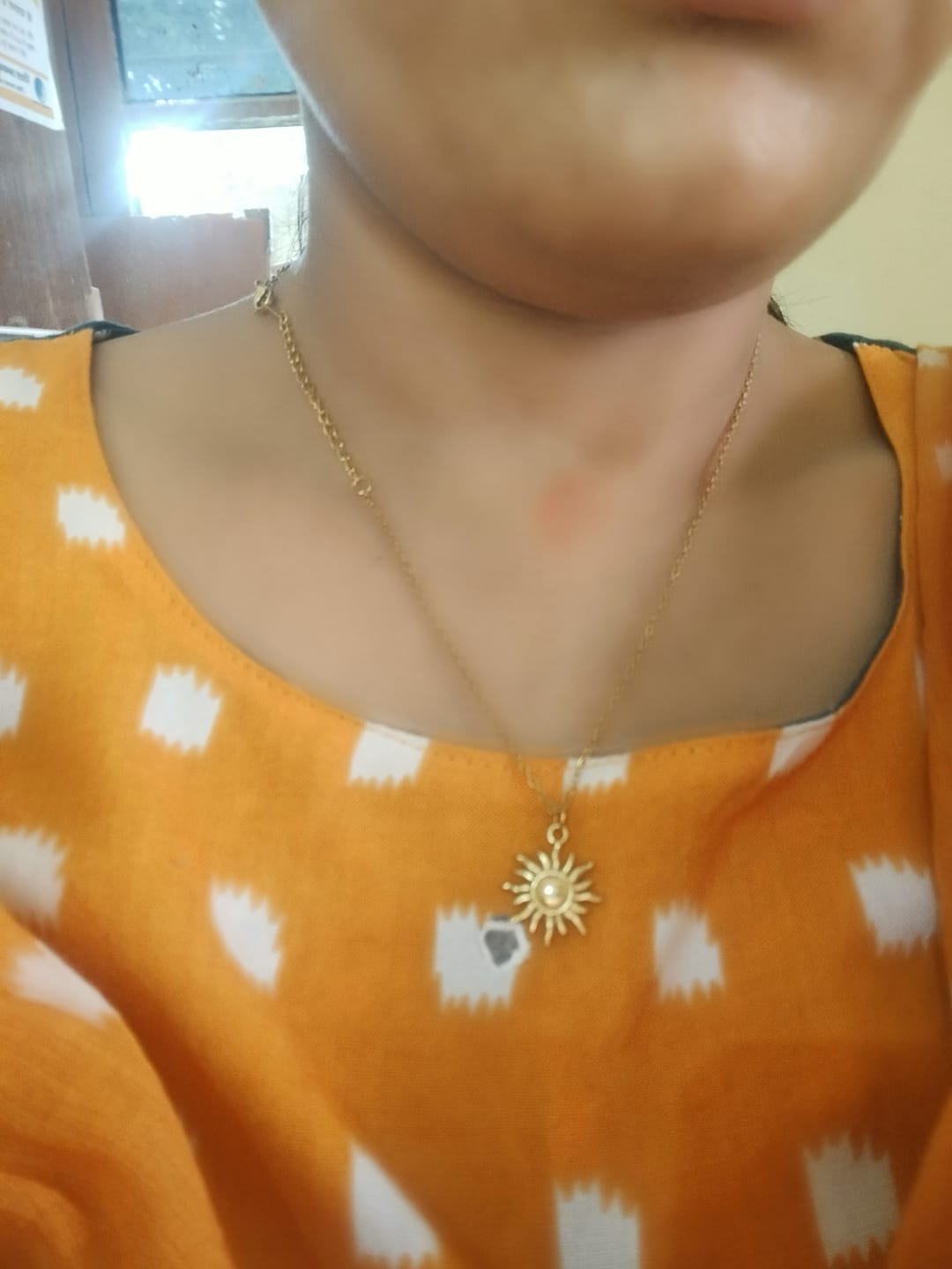Customer photo review of Glowing Sun Necklace
