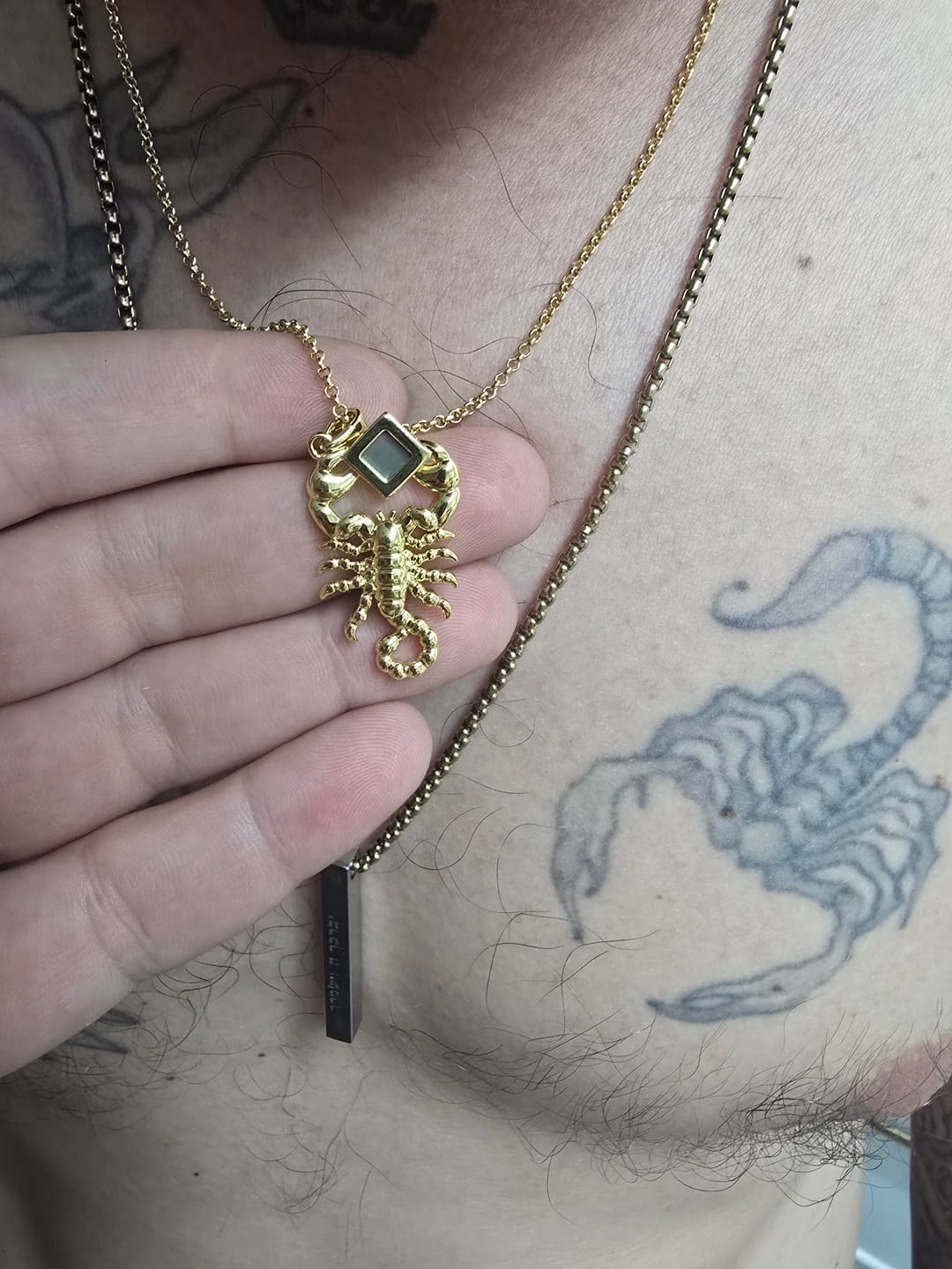 Customer photo review of שרשרת מזל עקרב לגבר