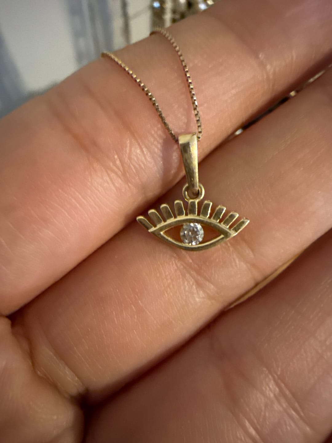 Customer photo review of Dije Ojo Turco Con Zirconia Blanca