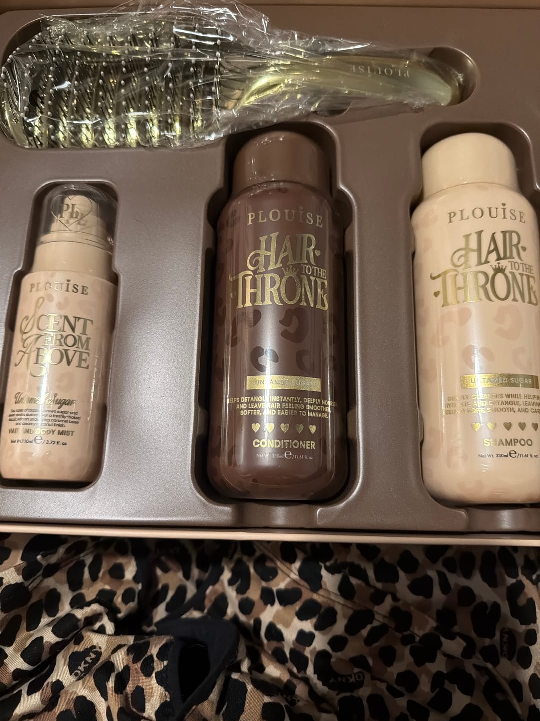 Customer photo review of Cheetah Claim To Tame Hair Care Set