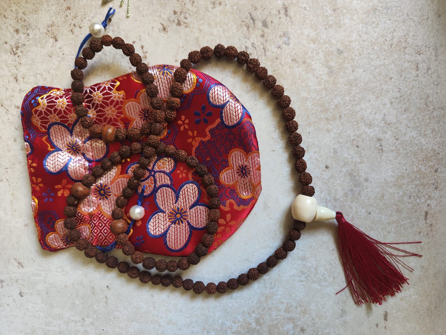 Customer photo review of Mala Rudraksha & Coquillage