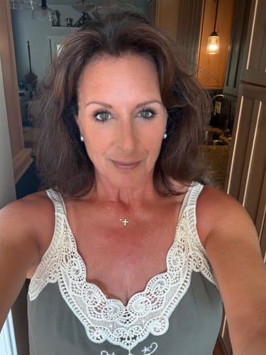 Customer's face showing a subtle, radiant glow after applying the Bronzer.