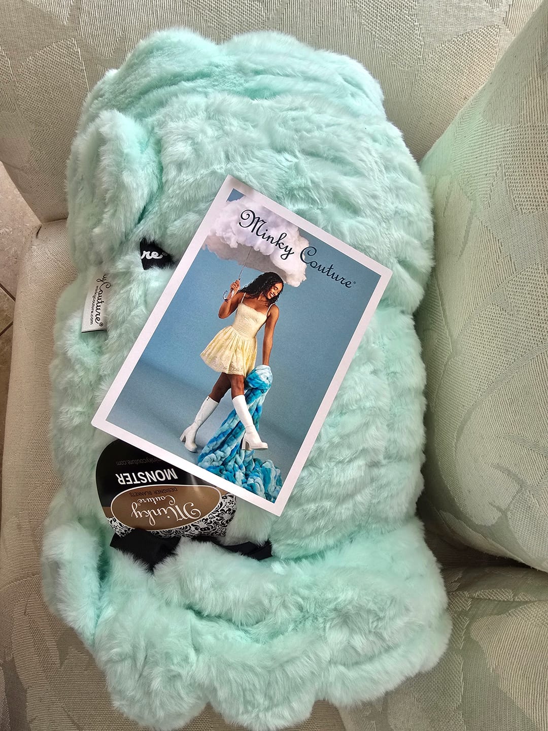 Customer photo review of Hugs Light Aqua Serene Blanket