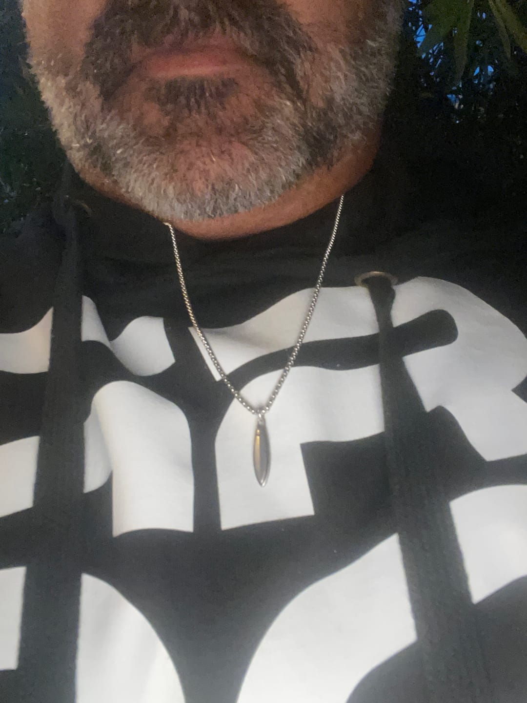 Customer photo review of Huntington Surfboard Necklace