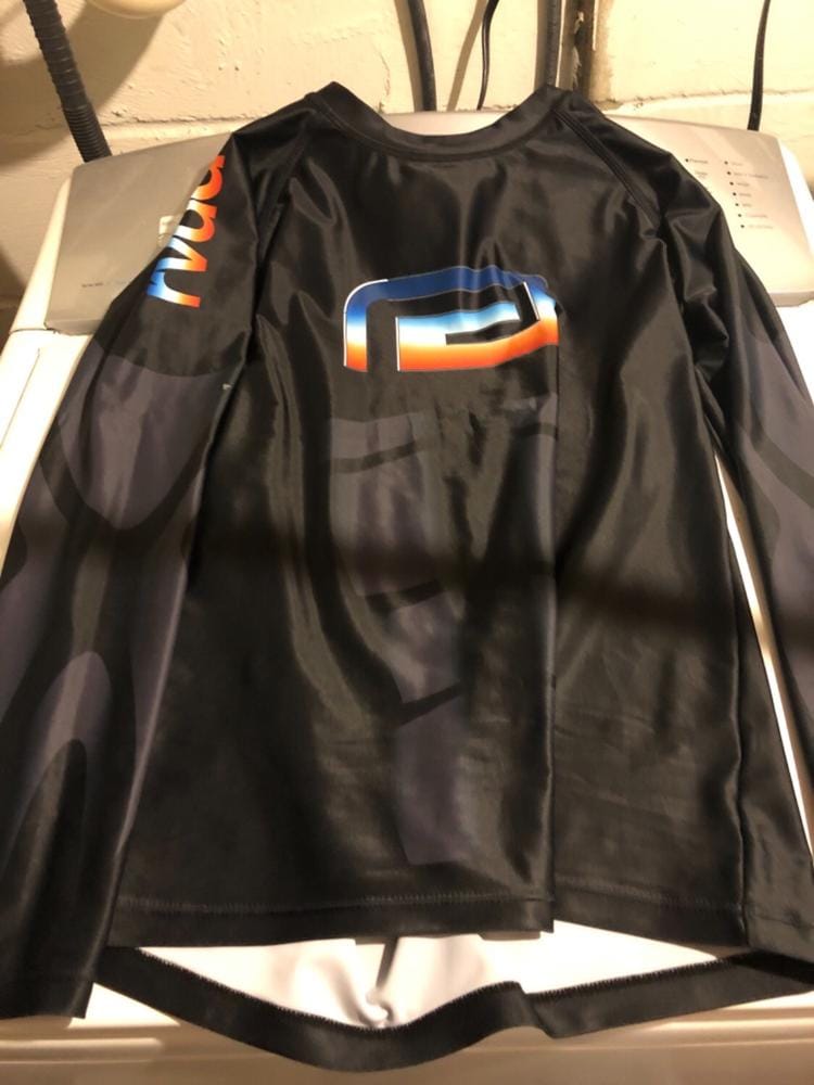 Customer photo review of Big Mark Rash Guard