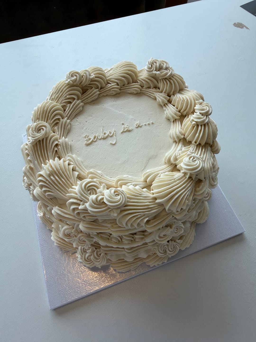Customer photo review of gender reveal cake