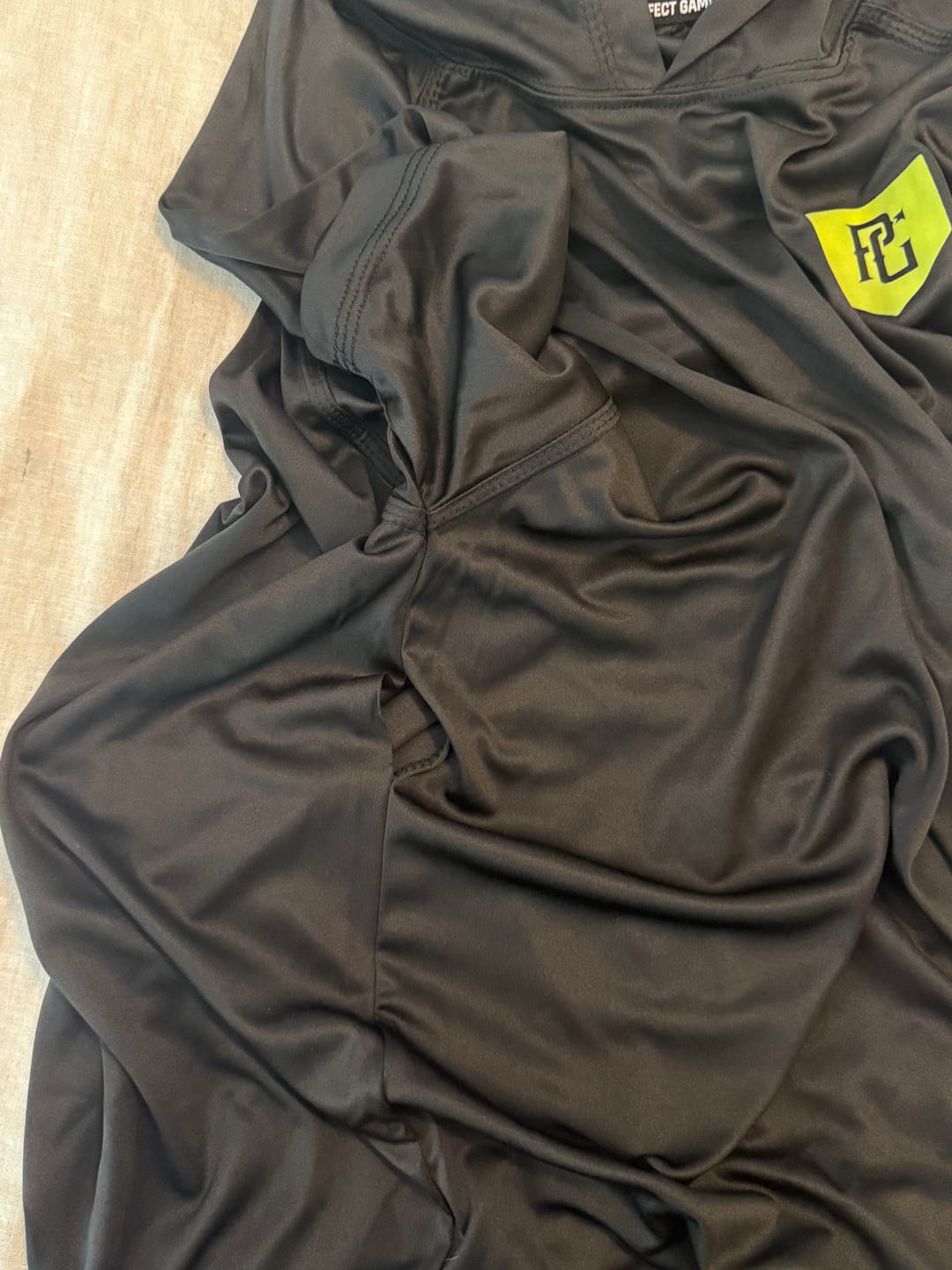 Customer photo review of STRIKE PERFORMANCE TEE