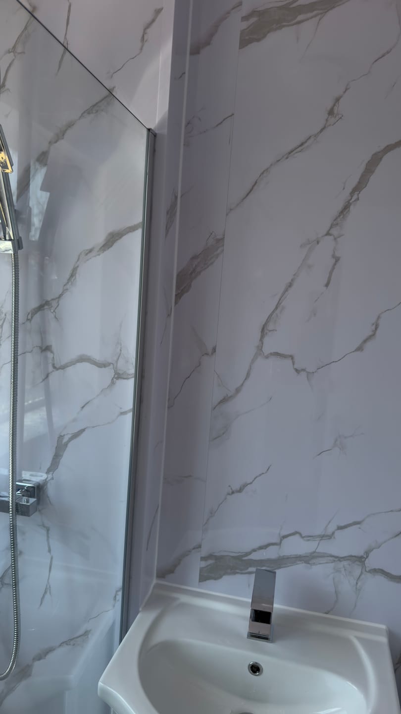 Customer photo review of Premium Carrara White Marble Gloss Shower Wall Panel - 1M x 2.4M