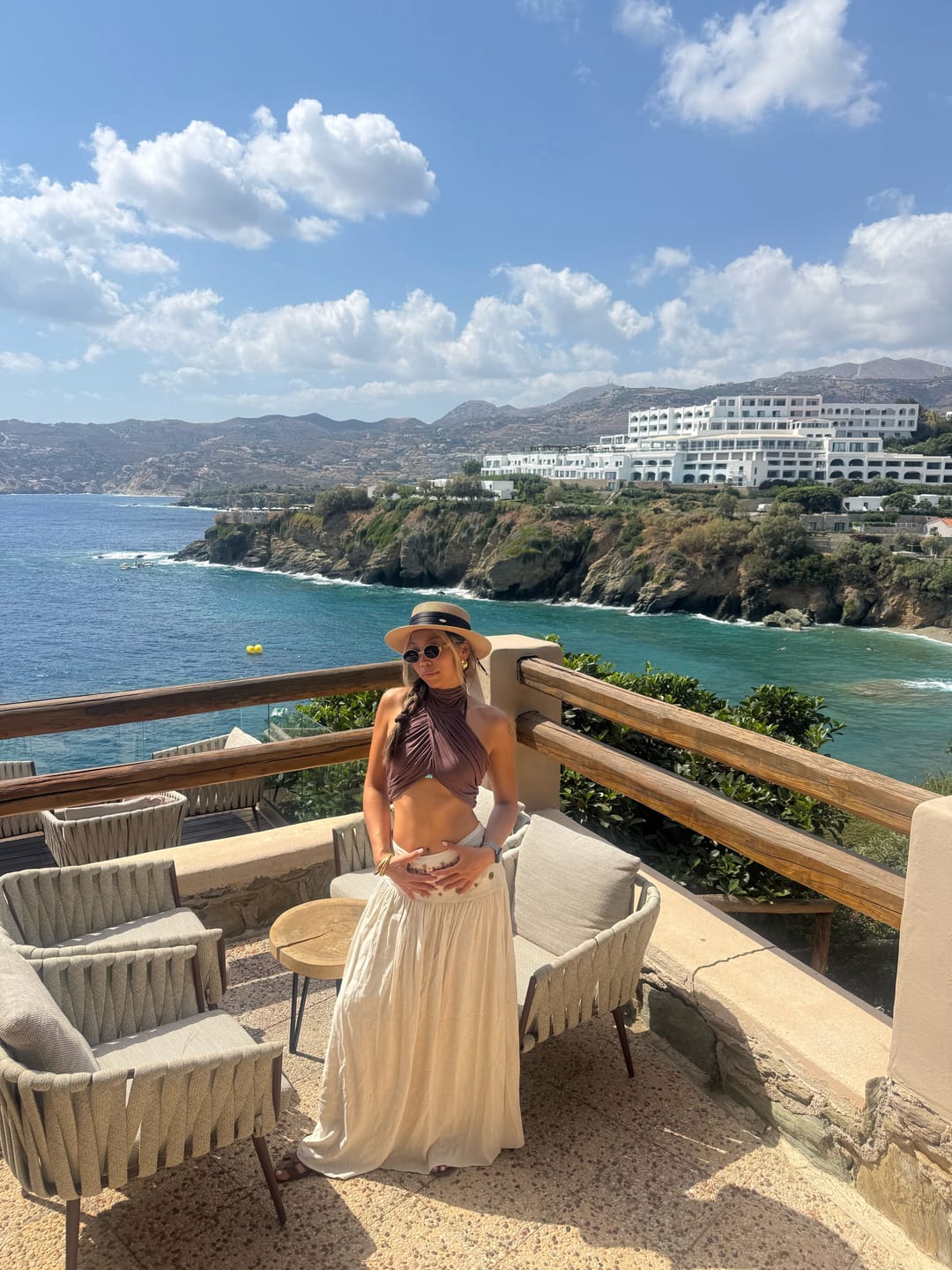 Customer photo review of ROVENTE Cross-Drape Halter Top with High Neck Twist Detail