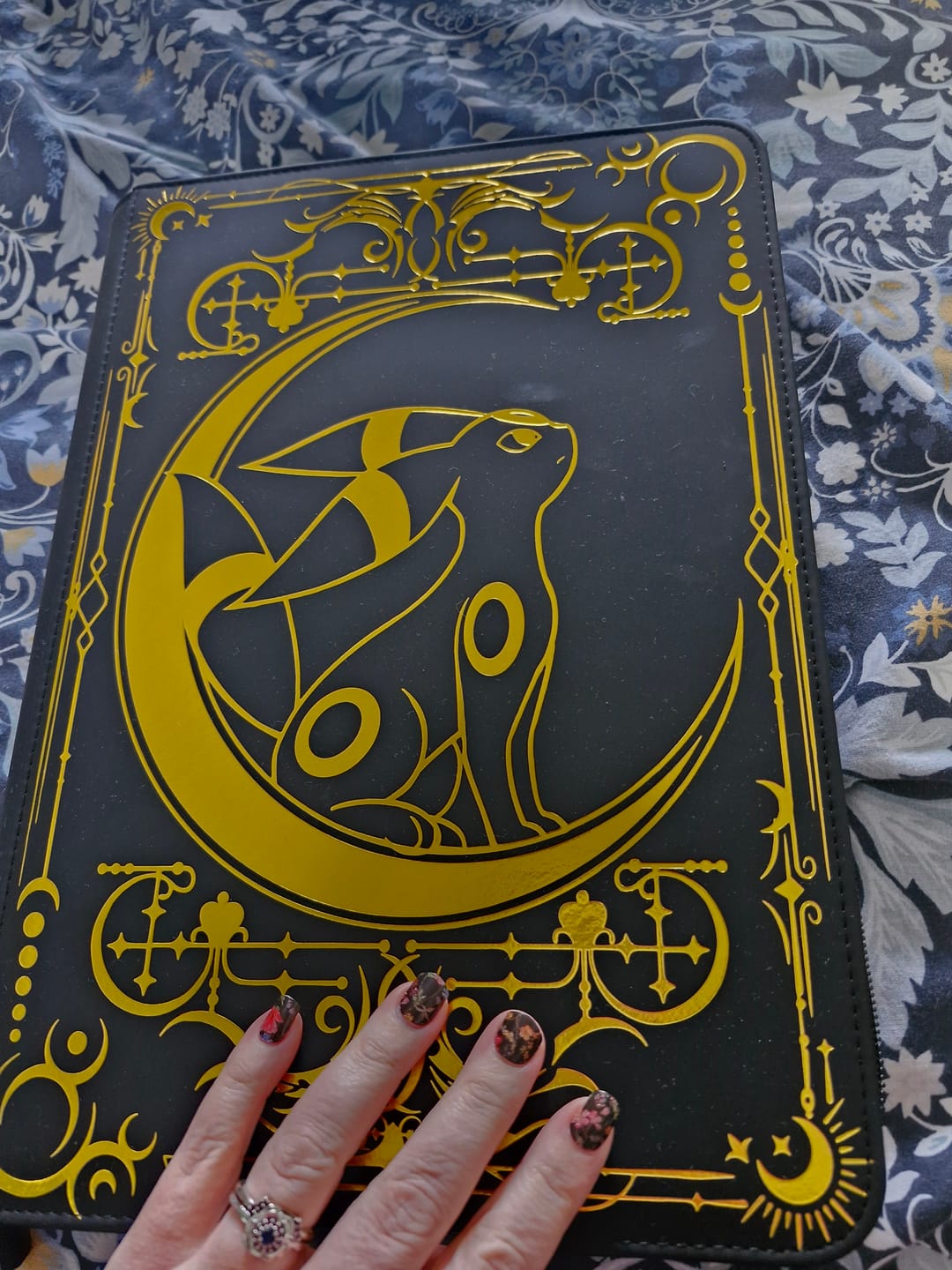 Customer photo review of Lunar Shadow 9-Pocket Trading Card Binder