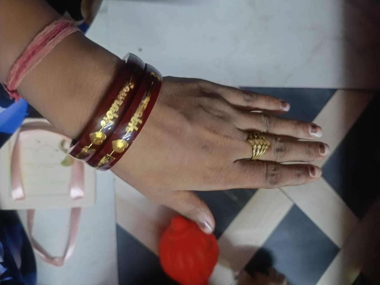 Customer photo review of Anmol Bandhan Customized Gold Bangles –  Love & Togetherness crafted in Gold