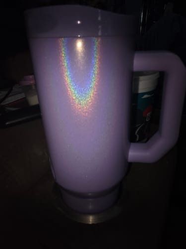 Reviewer's amethyst Thicc Buddy 40oz mug showing a rainbow light reflection on the side