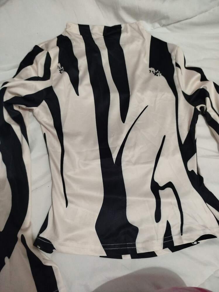 Customer photo review of Ninonine "Sloane" | Abstract Geometric Mock Neck Top