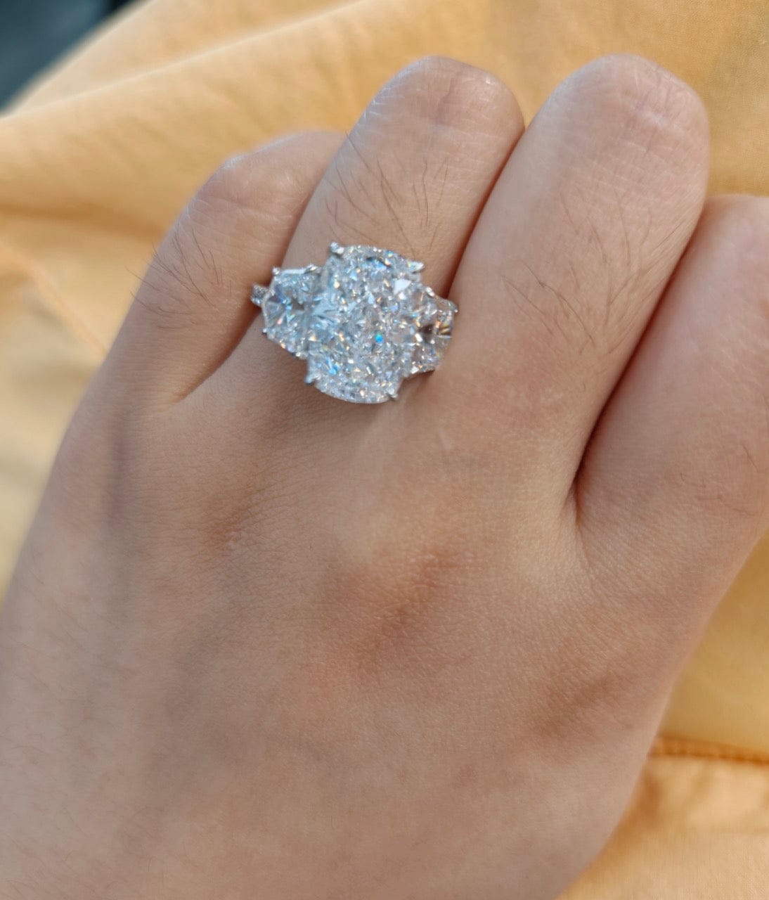Customer photo review of 6.0 Ct Elongated Cushion Cut Simulated Diamond Three-Stone Travel Engagement Ring in S925 Sterling Silver