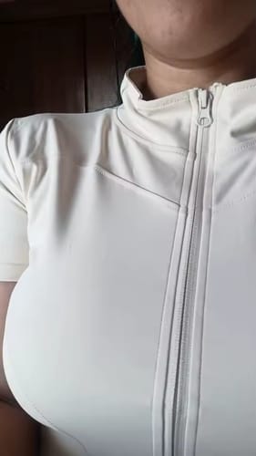 Customer photo review of Women’s Short-Sleeve Workout Top – Sculpt Zip
