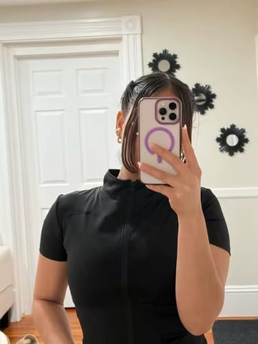 Customer photo review of Women’s Short-Sleeve Workout Top – Sculpt Zip