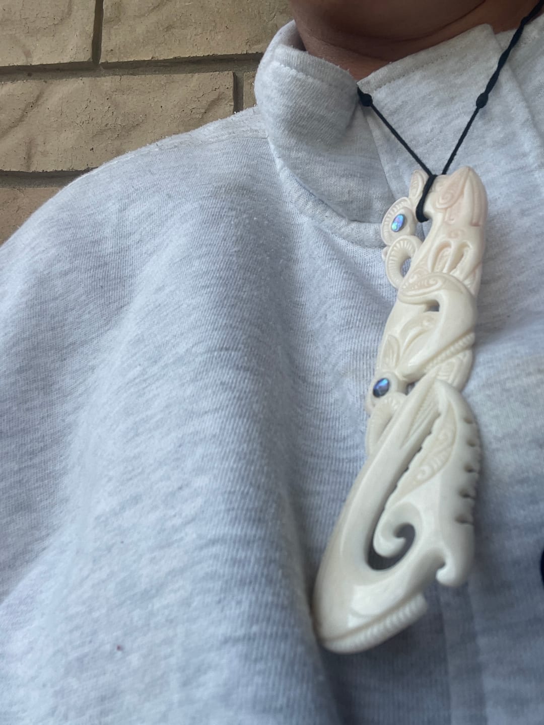 Customer photo review of Intricately Carved 12.5cm Maori Bone Manaia Necklace