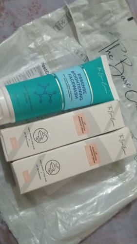 Customer's pack of two Lip Cream boxes and one brightening facewash tube delivered in a plastic shipping bag.
