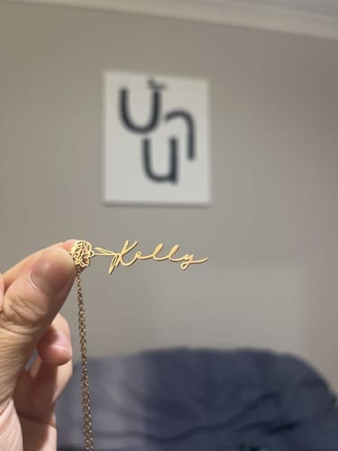 Customer photo review of Custom Birth Flower Name Necklace