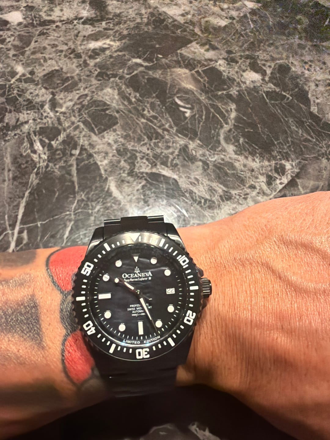 Customer photo review of Oceaneva Men's Deep Marine Explorer III 3000M Pro Diver Watch Black Mother Of Pearl Dial Black IP