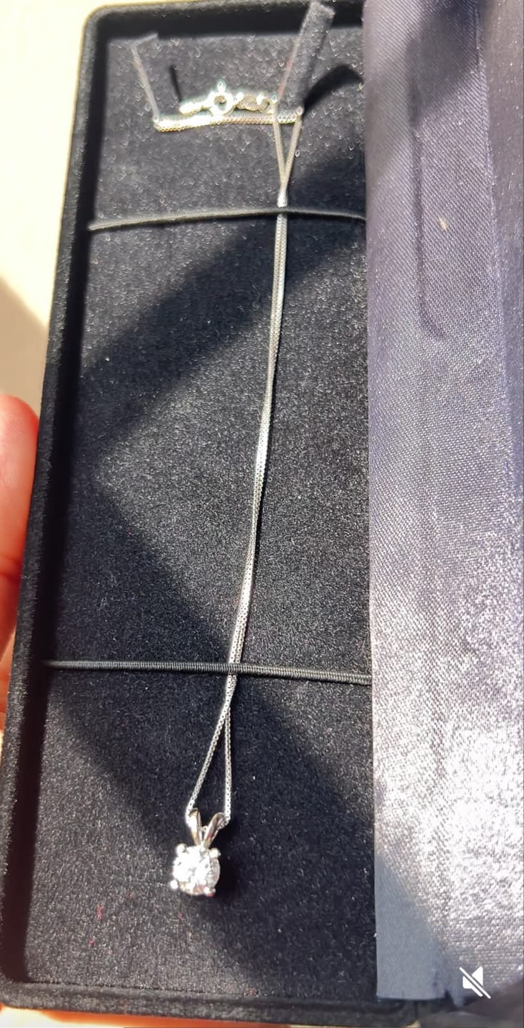 Customer photo review of Sparkling Aurora Moissanite Necklace — 1ct GRA Certified, 925 Silver