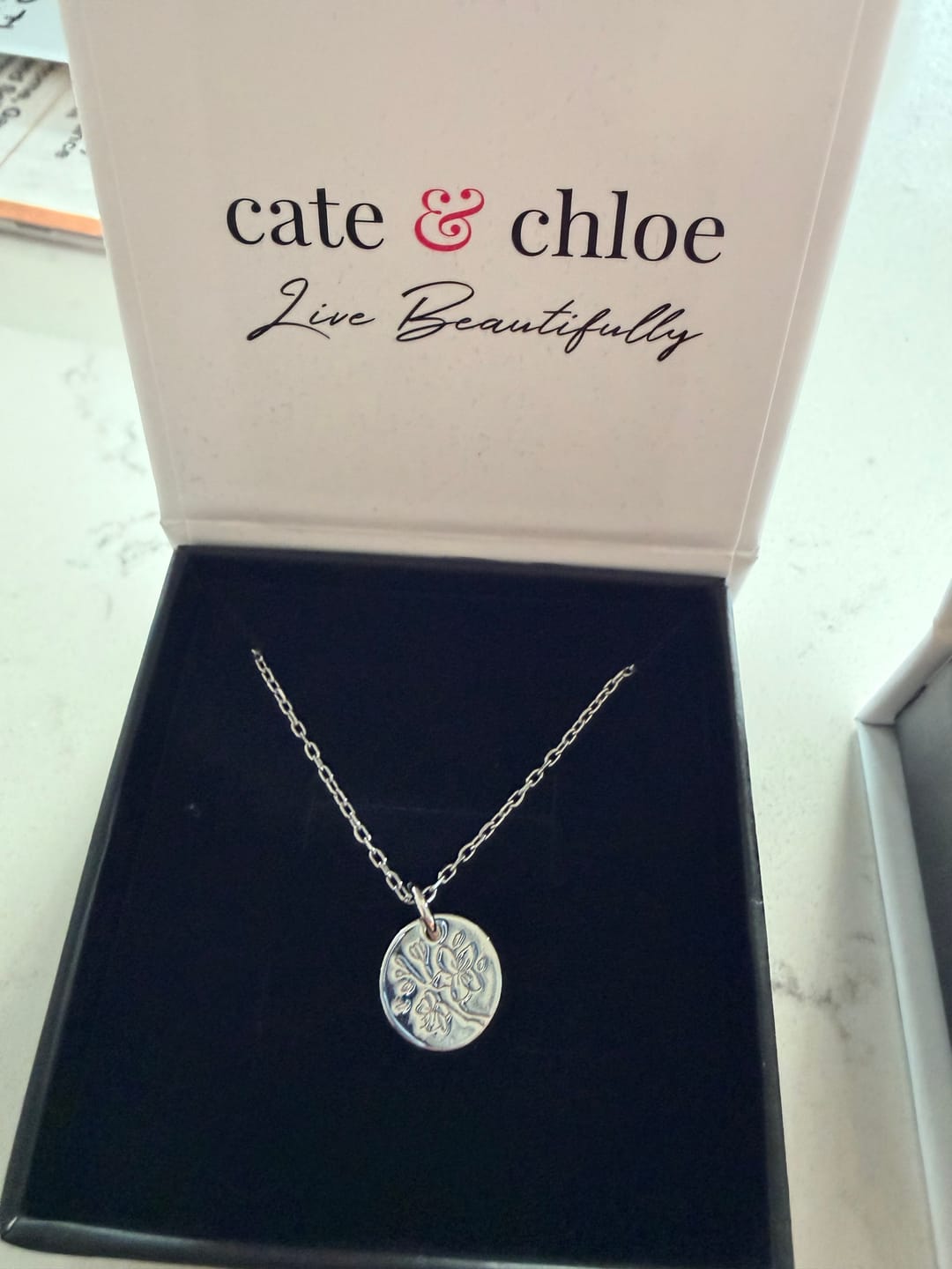 Customer photo review of Floral 18k White Gold Plated Engraved Birth Month Flower Pendant Necklace