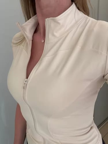 Customer photo review of Women’s Short-Sleeve Workout Top – Sculpt Zip