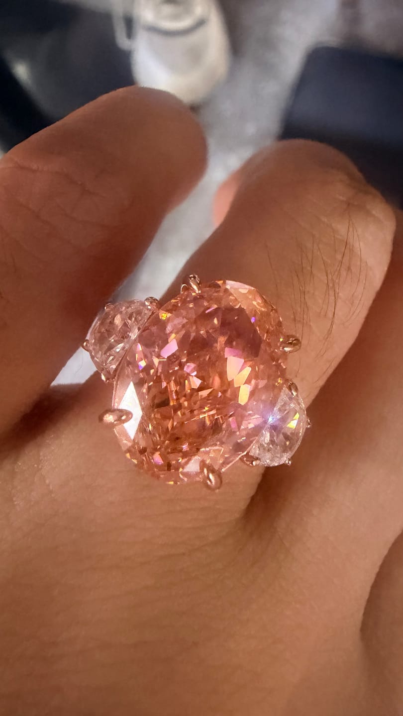 Customer photo review of 5.5Ct Pink Oval Cut Three Stone Engagement Ring Travel Ring In Sterling Silver